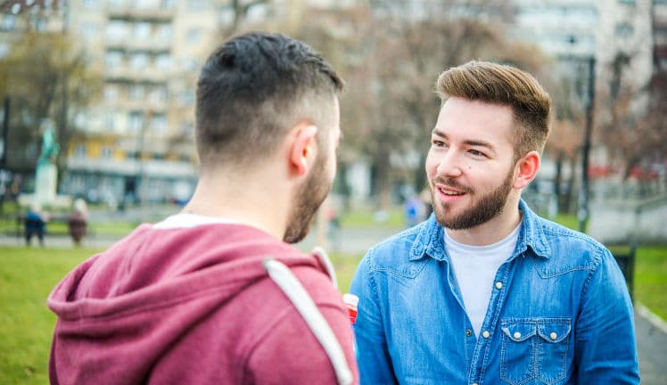 two men talking