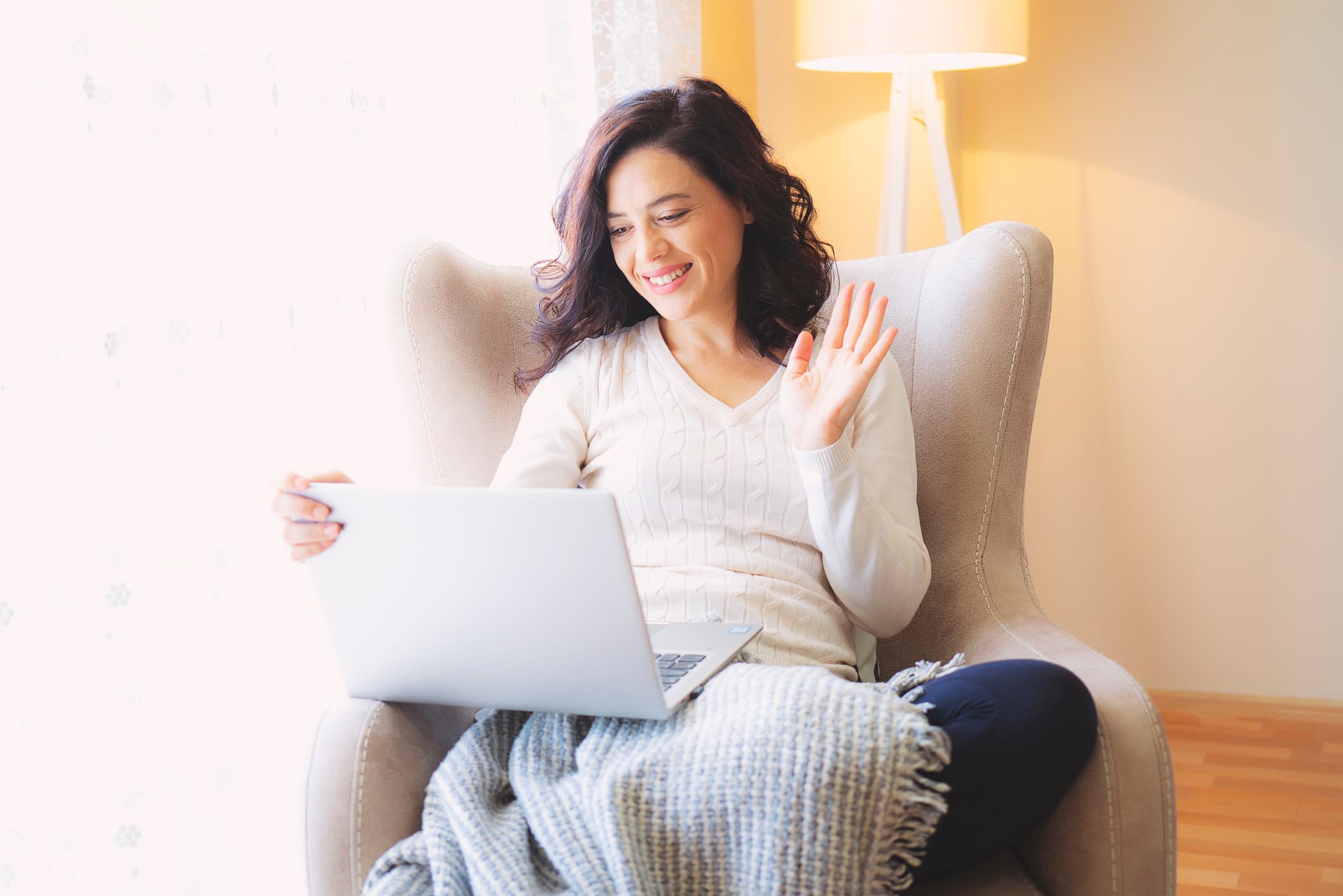 Female client using laptop for online counselling